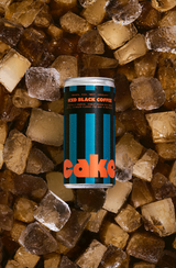 Can of iced black coffee on a bed of ice cubes
